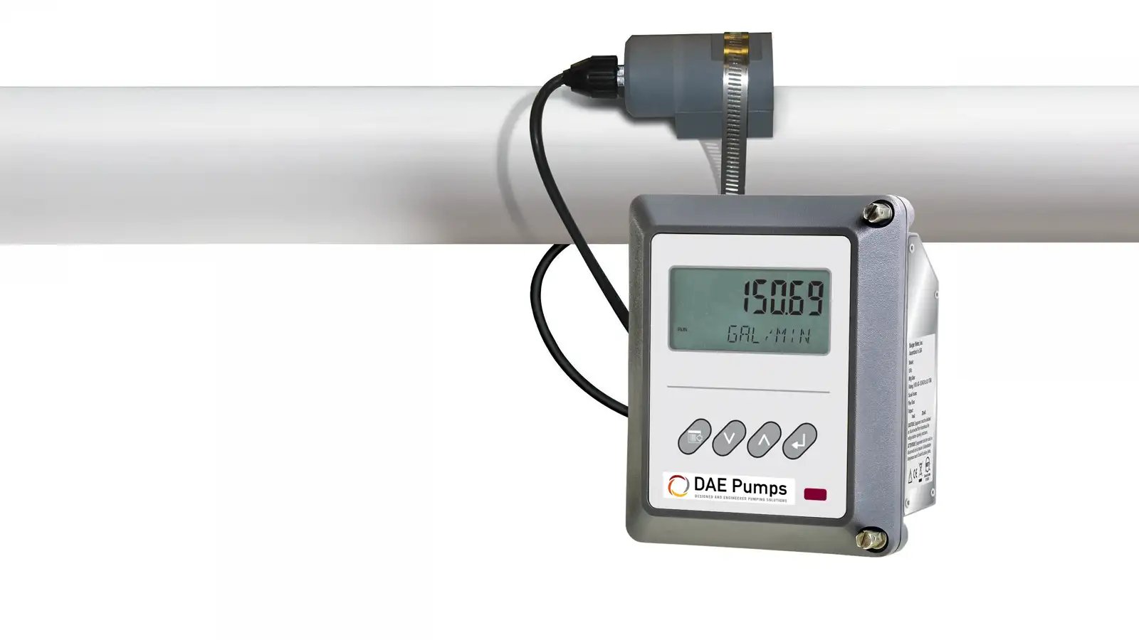 DAE Pumps clamp-on ultrasonic flow meter mounted on a pipe, its display reading.